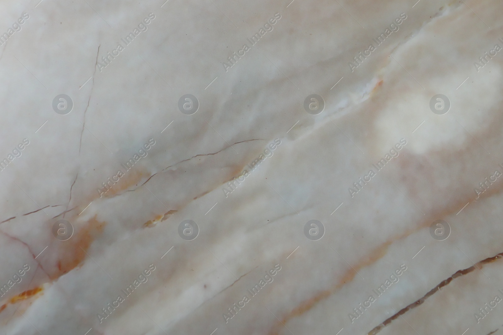 Photo of Texture of beige marble surface as background, closeup
