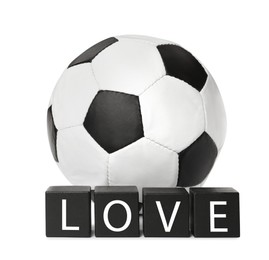 Photo of Soccer ball and cubes with word Love on white background