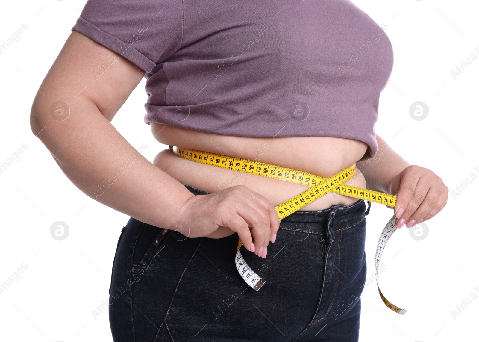 Photo of Overweight woman measuring waist with tape on white background, closeup