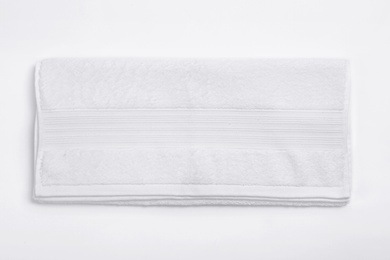 Photo of Clean soft towel on white background