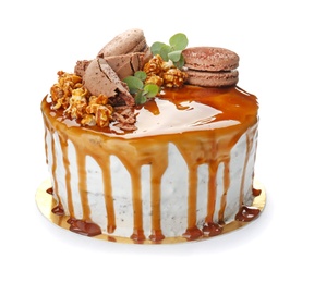 Photo of Delicious homemade cake with caramel sauce on white background