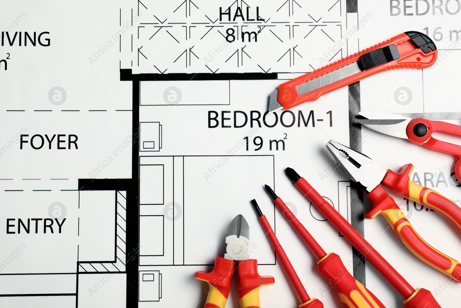 Photo of Flat lay composition with electrician's tools on house plan. Space for text