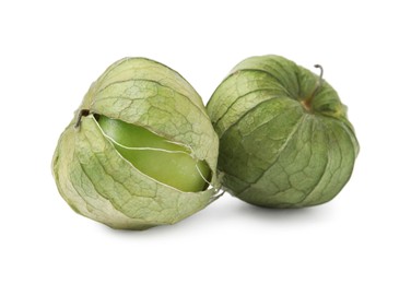 Photo of Fresh green tomatillos with husk isolated on white