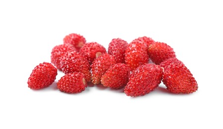 Photo of Ripe red wild strawberries isolated on white