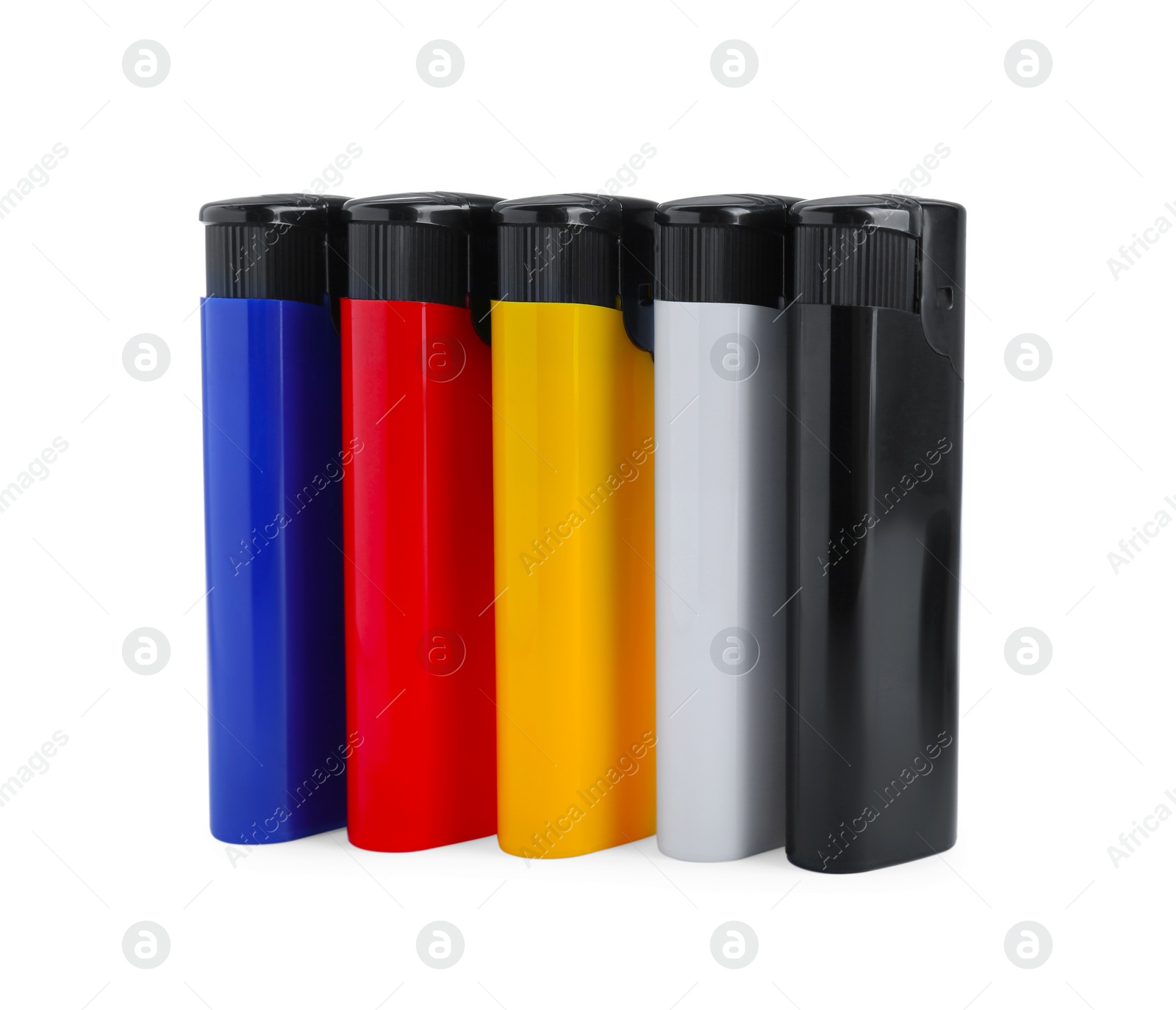 Photo of Stylish small pocket lighters on white background