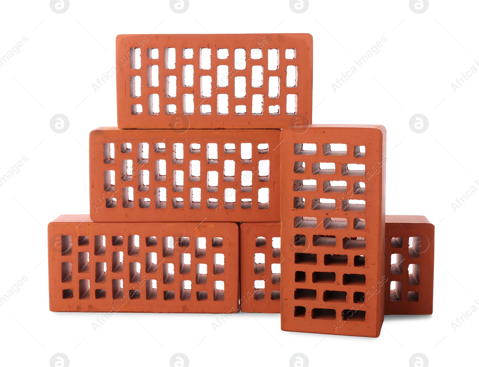 Photo of Many red bricks on white background. Building material