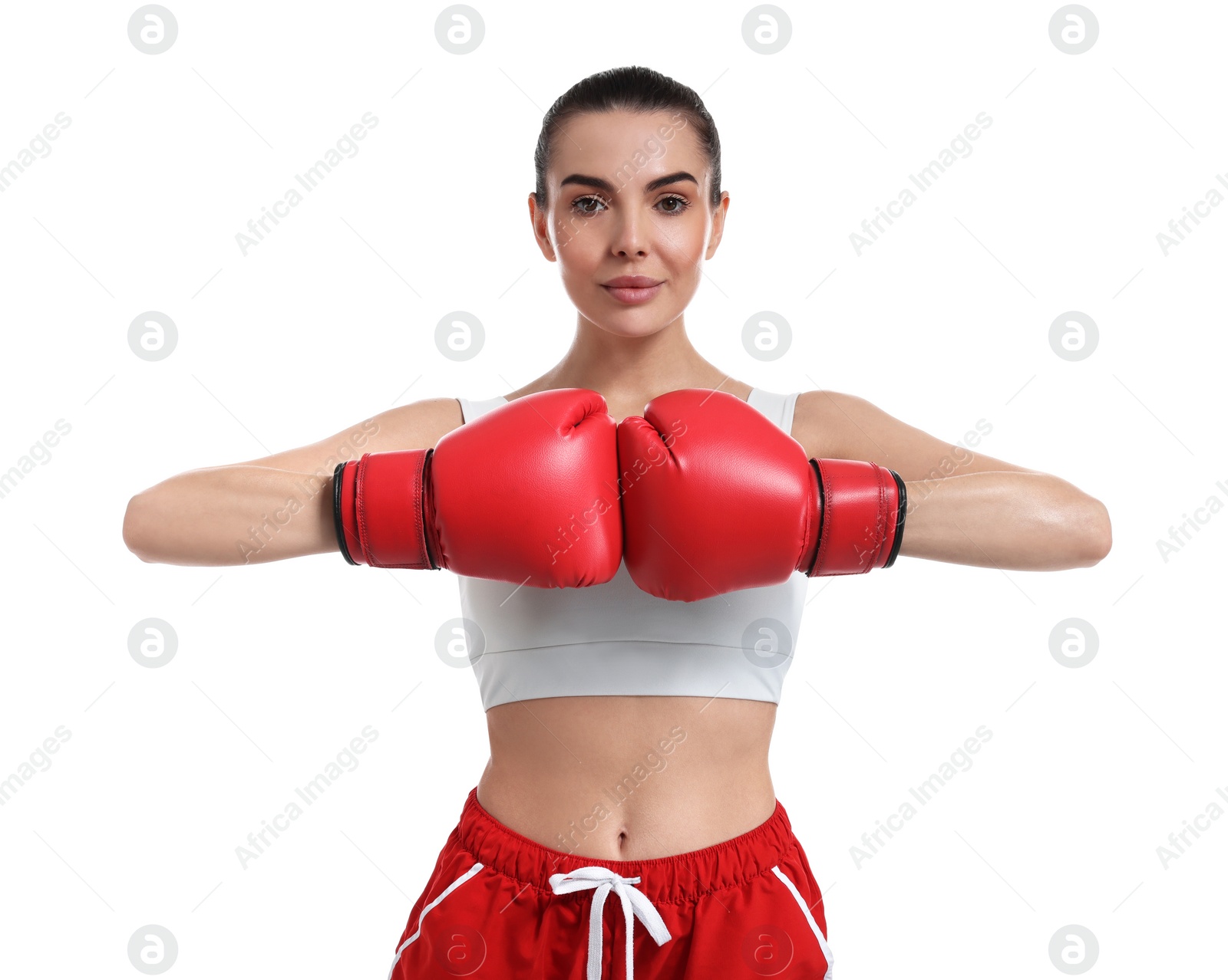 Photo of Beautiful woman in boxing gloves on white background