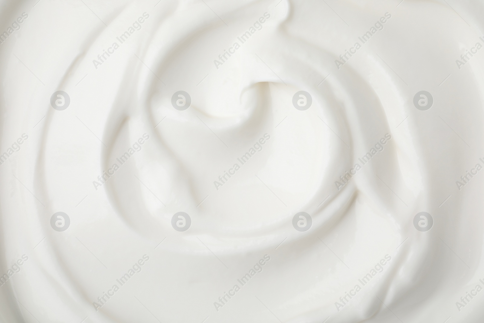 Photo of Delicious natural yogurt as background, top view