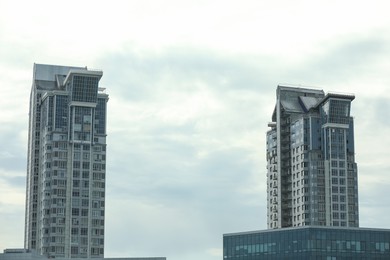 View of modern buildings against blue sky