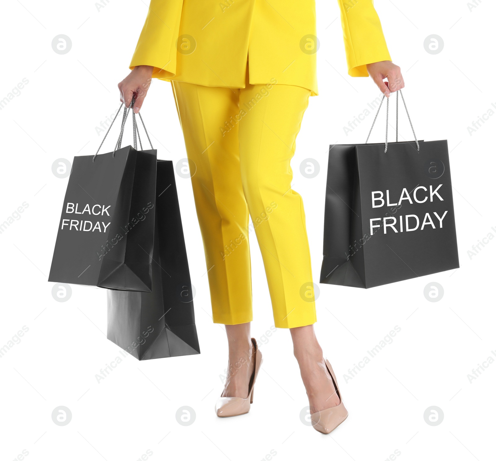 Photo of Woman with shopping bags on white background, closeup. Black Friday Sale