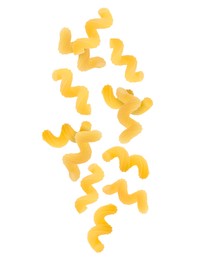 Image of Raw cavatappi pasta falling on white background