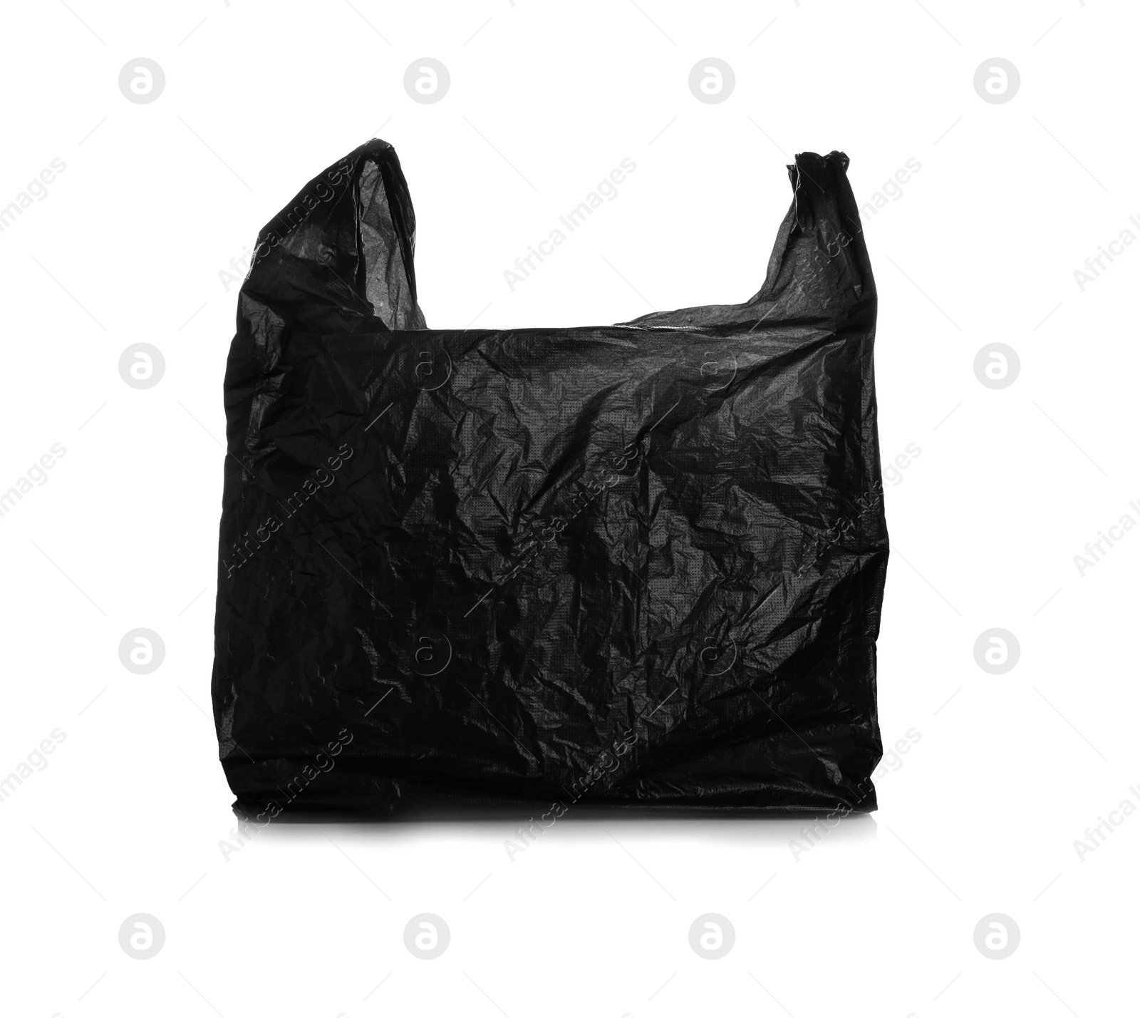 Photo of Black disposable plastic bag on white background