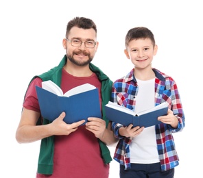 Little boy and his dad with books on white background