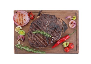 Delicious fried beef meat with vegetables isolated on white, top view