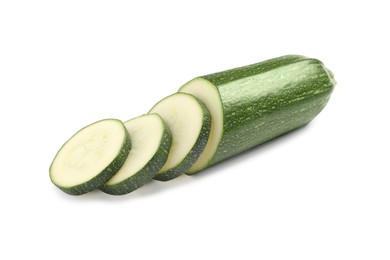 Photo of Cut raw ripe zucchini on white background