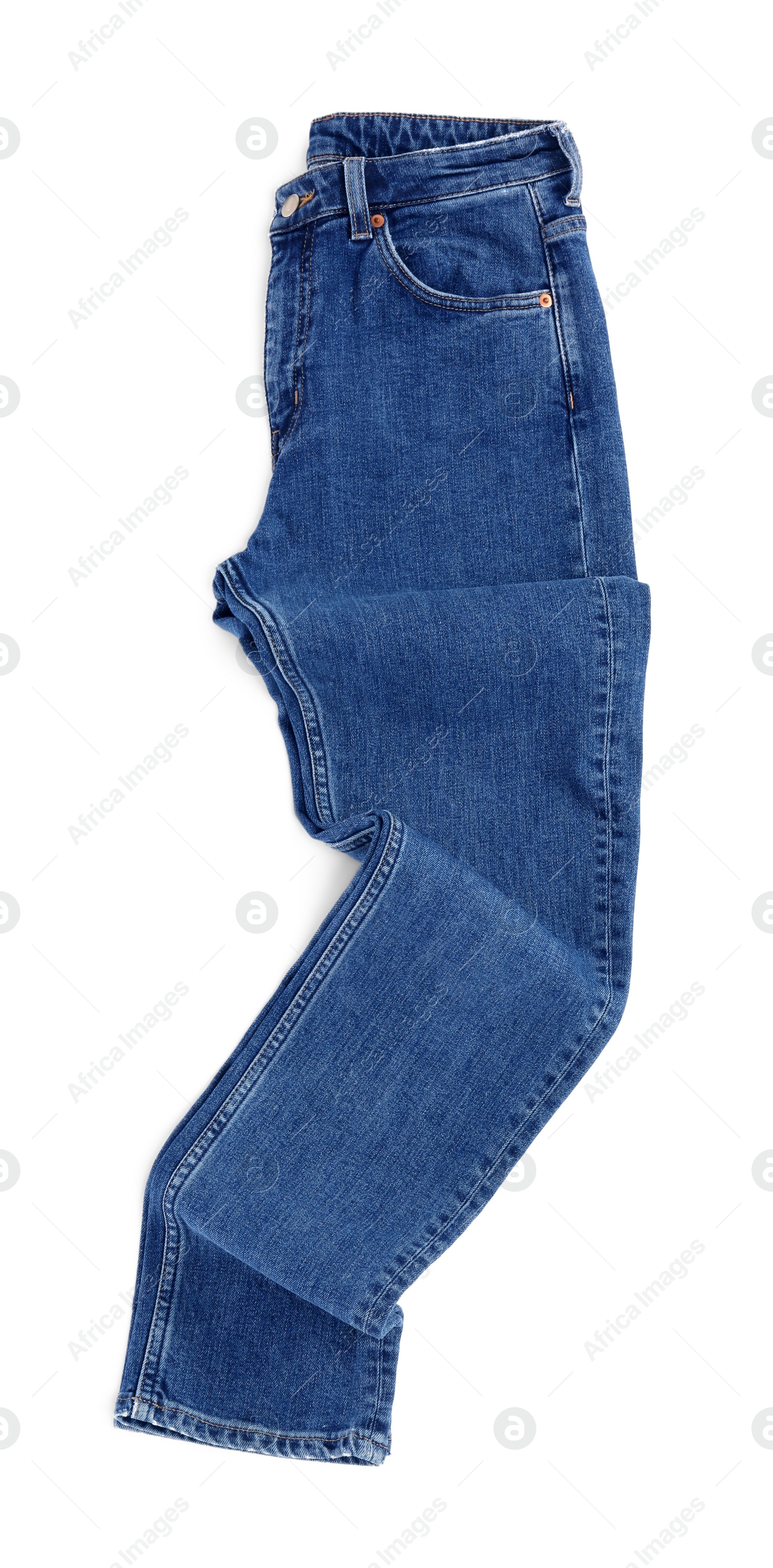 Photo of Rumpled dark blue jeans isolated on white, top view. Stylish clothes