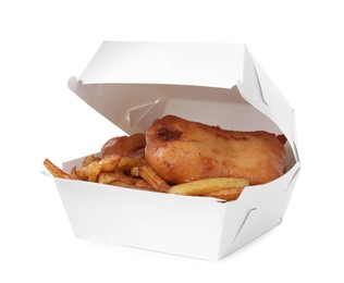 Photo of Tasty fish and chips in paper box isolated on white