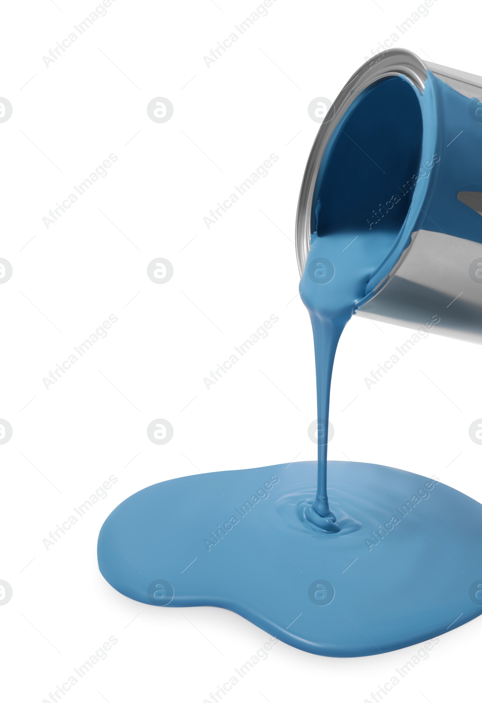 Photo of Pouring light blue paint from can on white background, closeup