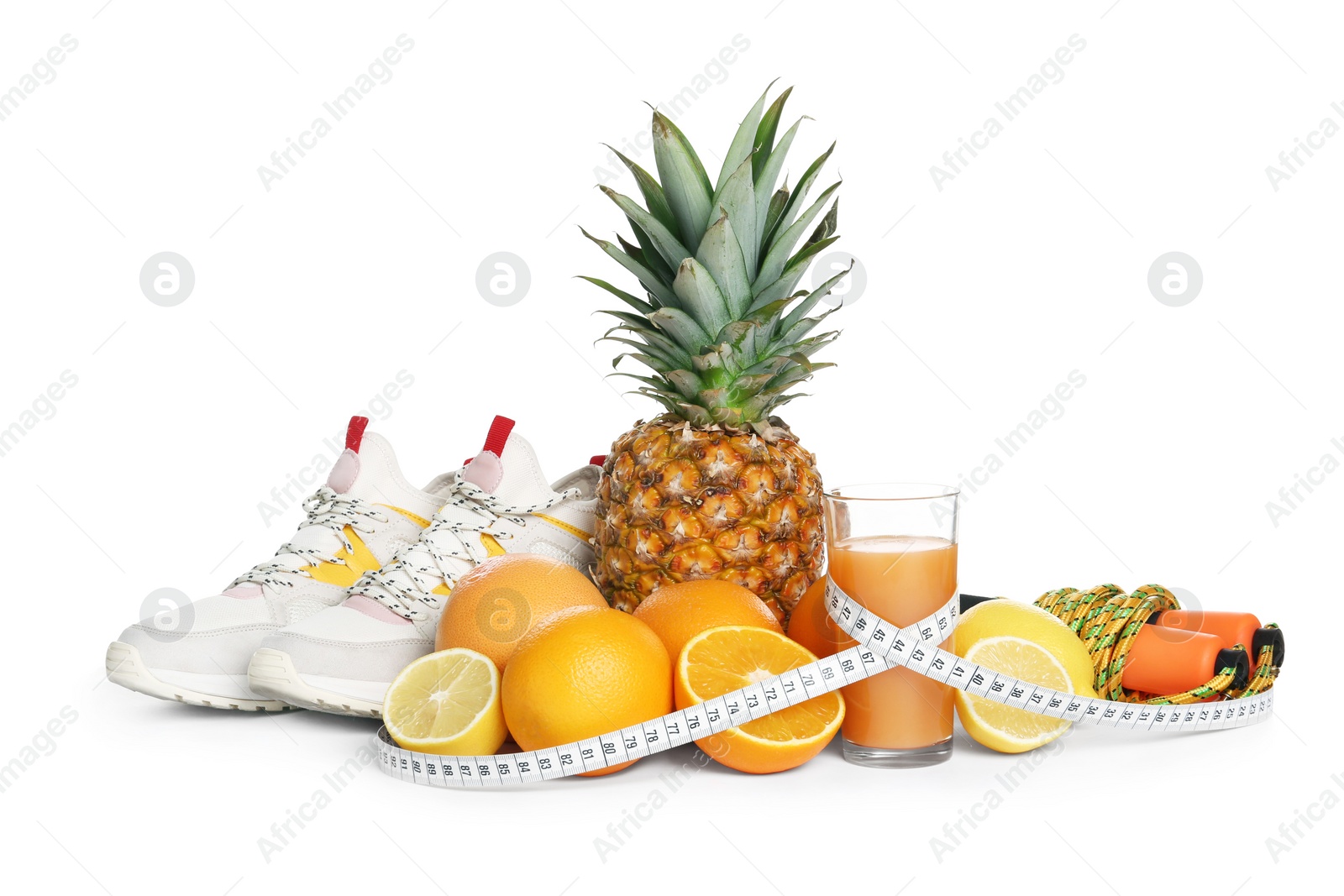 Photo of Healthy food, measuring tape and sneakers on white background. Concept of weight loss