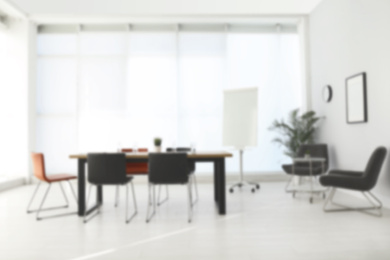 Image of Blurred view of modern office interior 