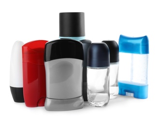 Set of different male deodorants on white background