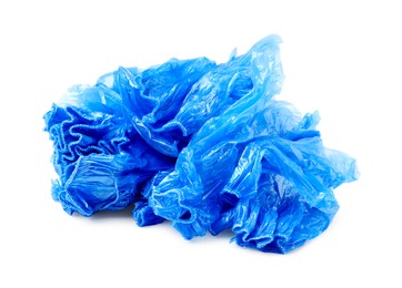 Photo of Pile of many blue medical shoe covers isolated on white