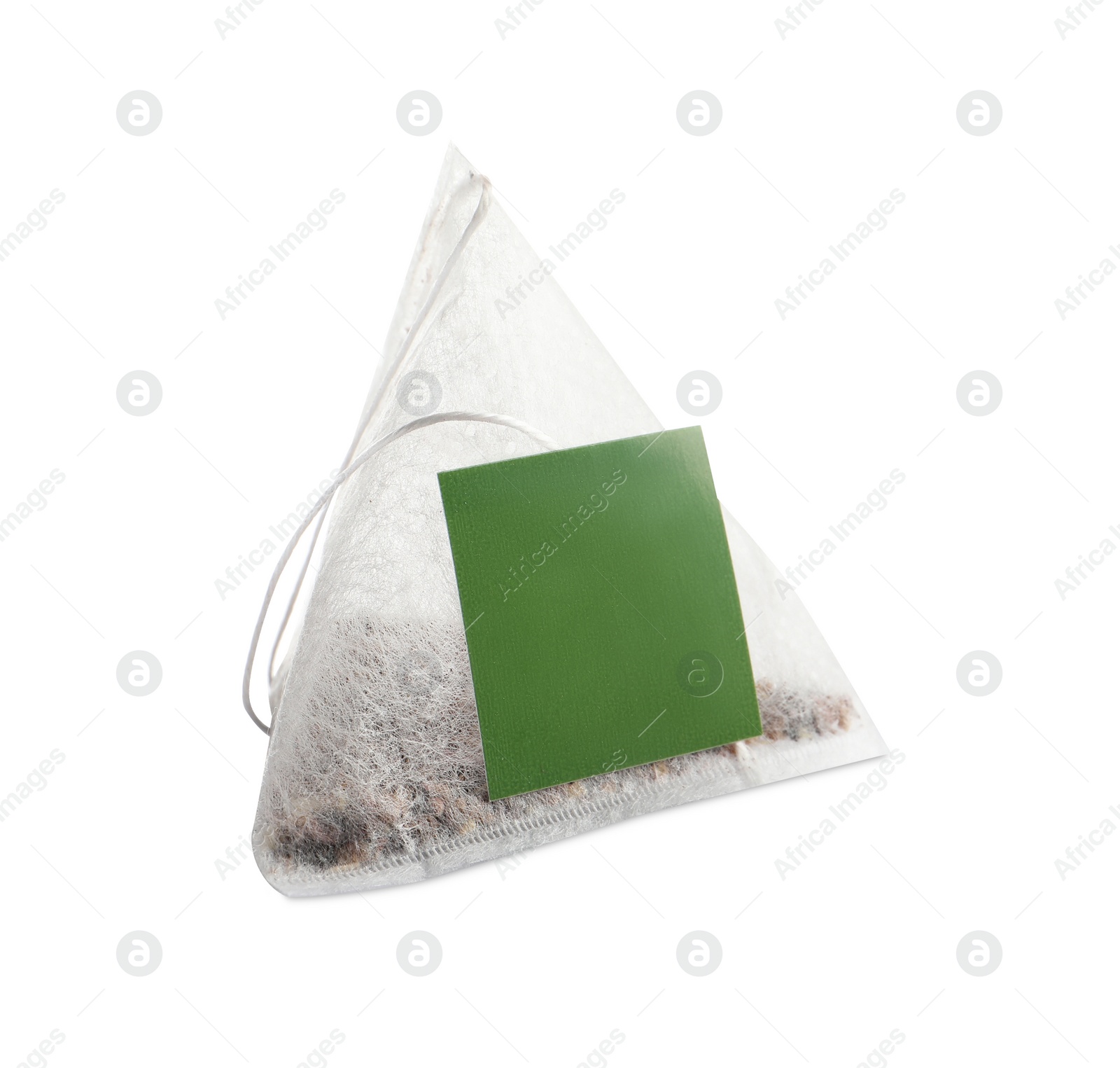 Photo of New pyramid tea bag isolated on white