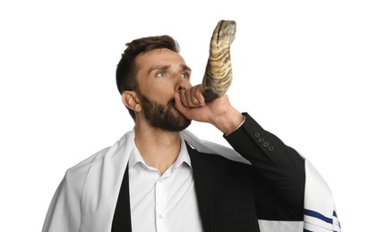 Photo of Jewish man in tallit blowing shofar on white background. Rosh Hashanah celebration
