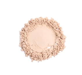 Photo of Sample of crushed face powder on white background, top view