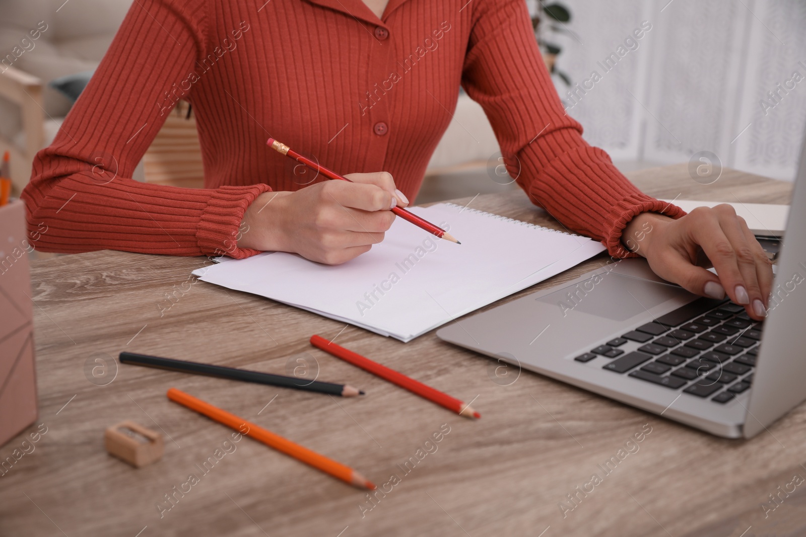 Photo of Woman drawing picture at online art lesson indoors, closeup. Distant learning