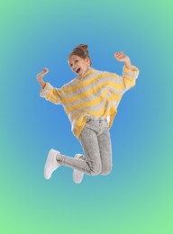 Happy cute girl jumping on color gradient background