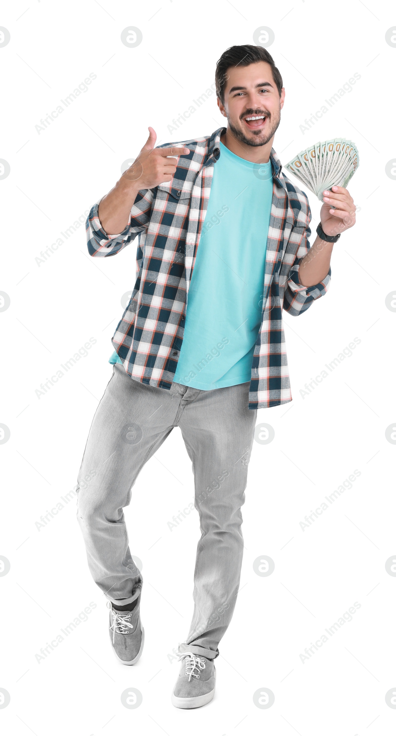 Photo of Handsome young man with dollars on white background