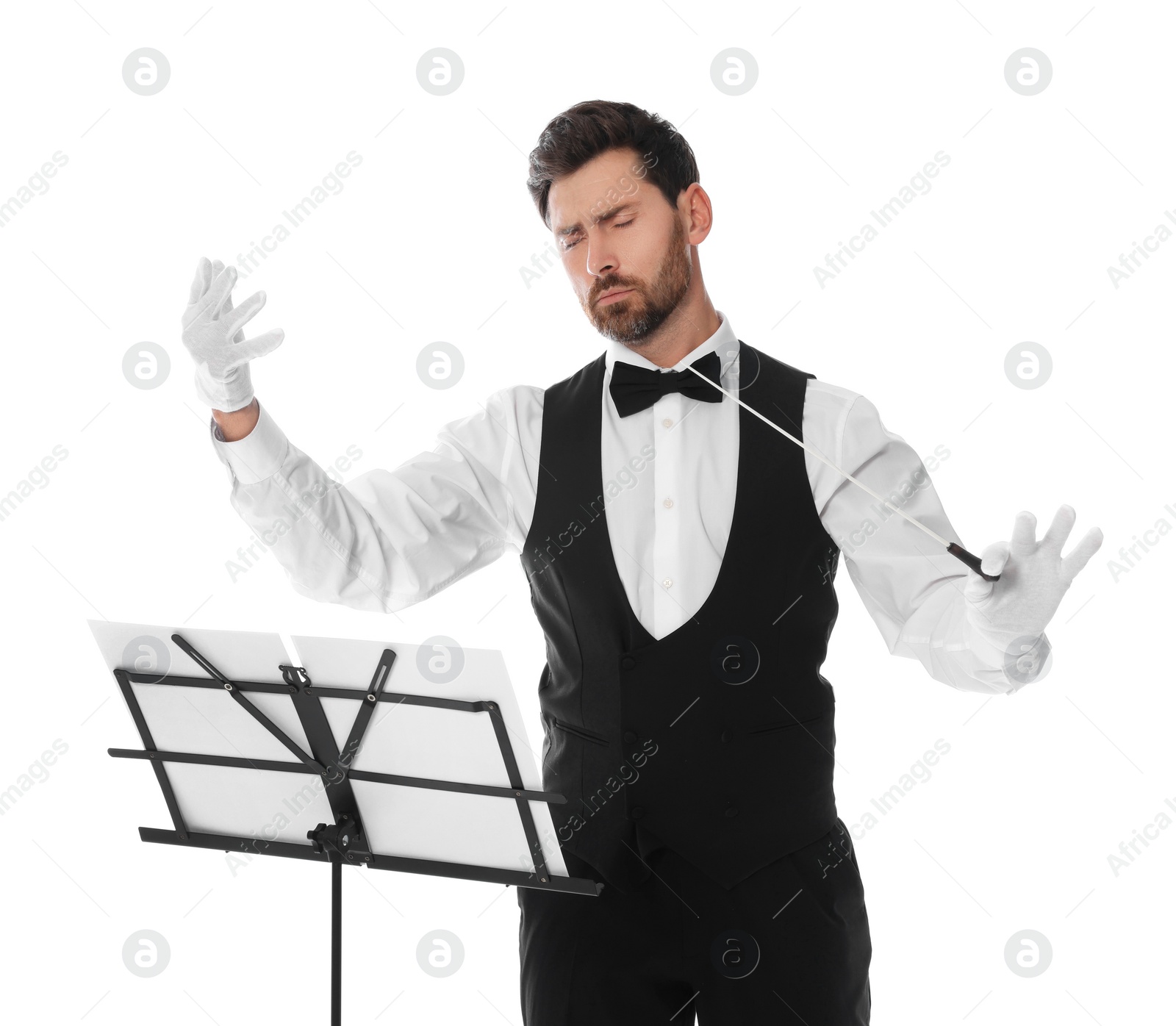 Photo of Professional conductor with baton and note stand on white background