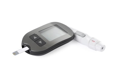 Photo of Digital glucometer and lancet pen on white background