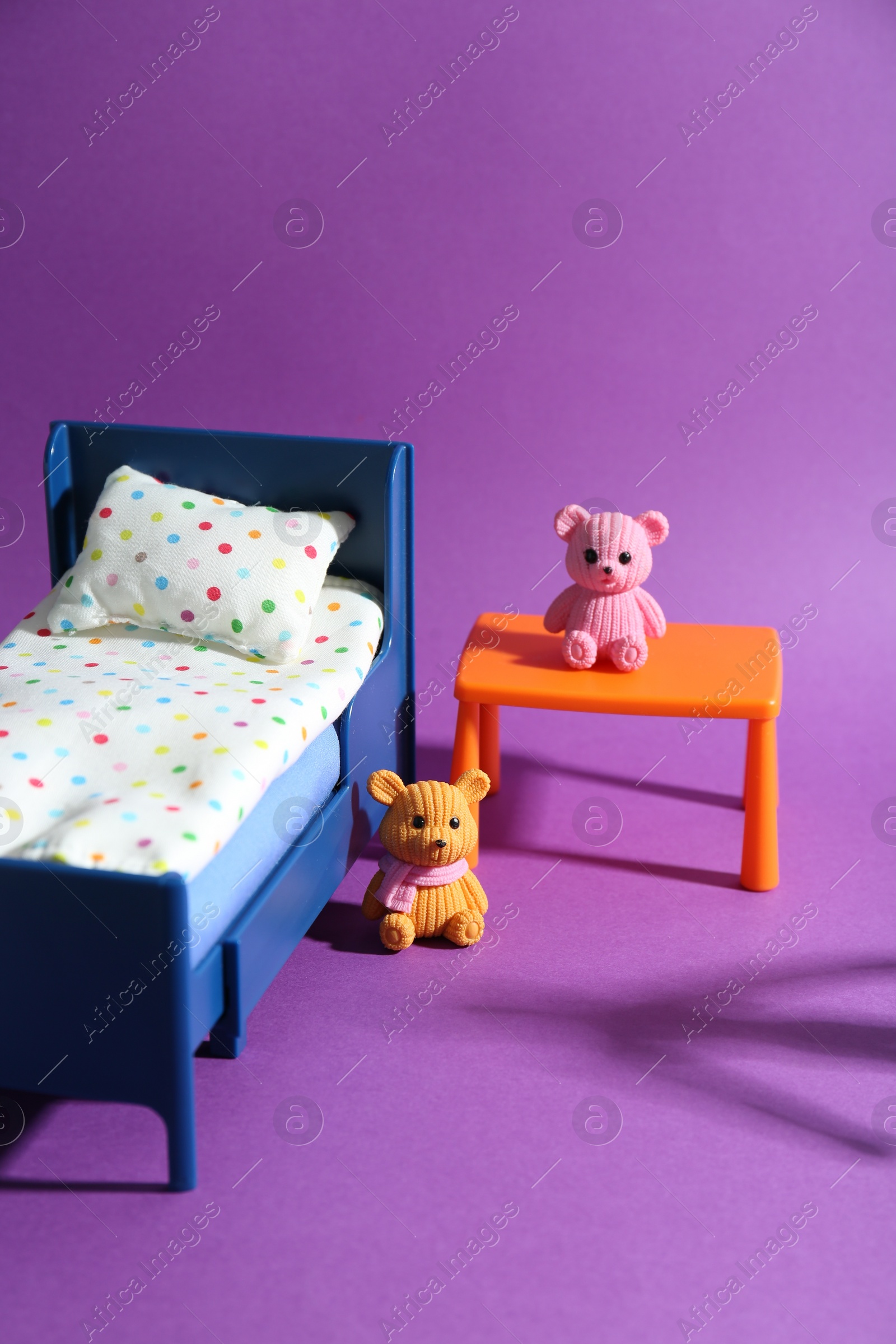 Photo of Stop child abuse. Little toy bears and scary shadow in kid's bedroom
