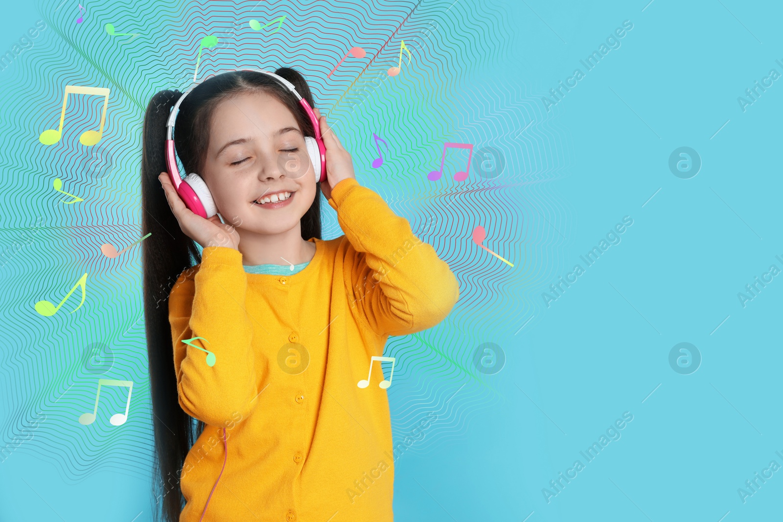 Image of Cute girl listening to music through headphones on light blue background, space for text. Music notes illustrations