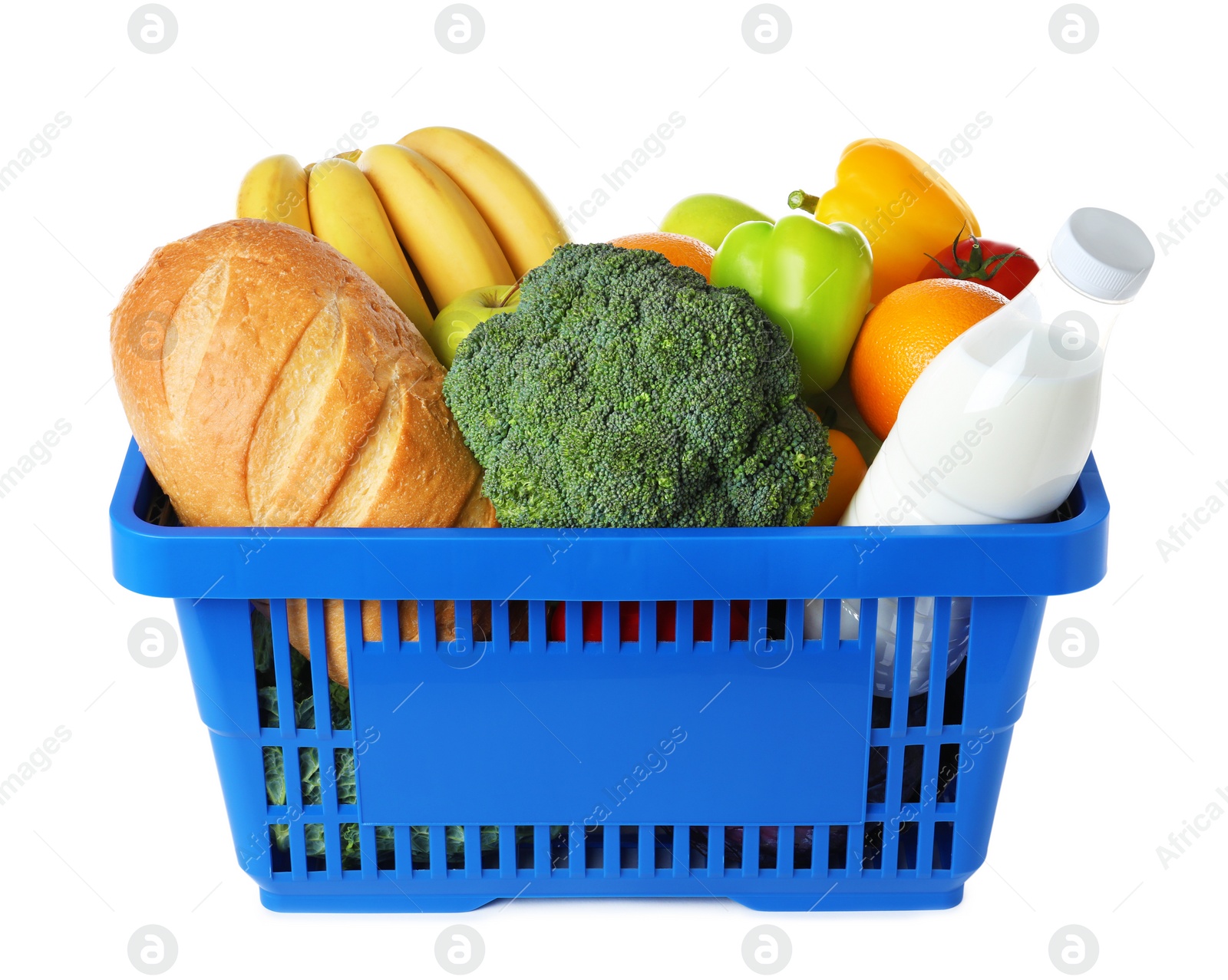 Photo of Shopping basket with grocery products on white background