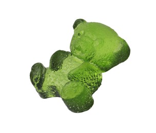 Photo of Delicious green gummy bear candy isolated on white