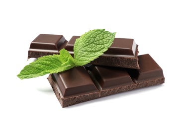 Pieces of dark chocolate with mint on white background