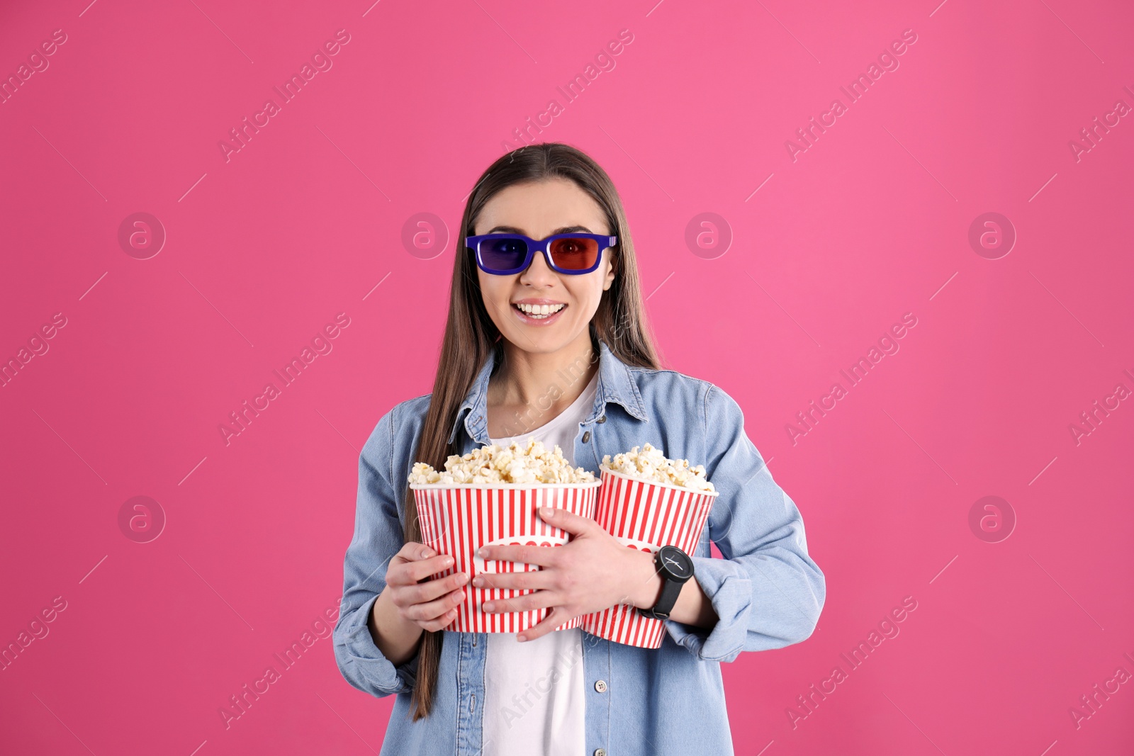Photo of Young woman with 3D glasses and tasty popcorn on color background