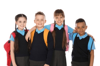 Portrait of cute children in school uniform on white background