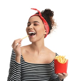 Photo of African American woman eating French fries on white background