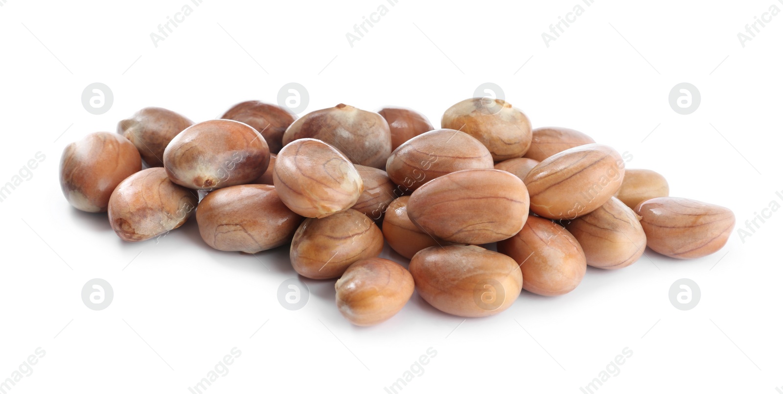 Photo of Many raw jackfruit seeds on white background