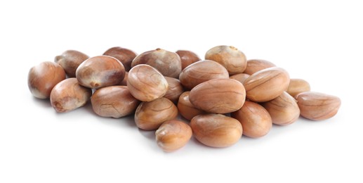 Photo of Many raw jackfruit seeds on white background