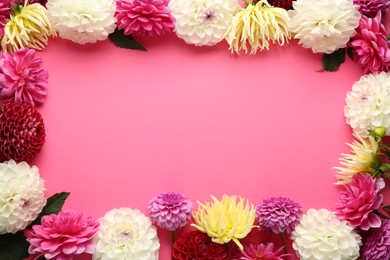 Photo of Frame made of beautiful dahlia flowers on pink background, flat lay. Space for text