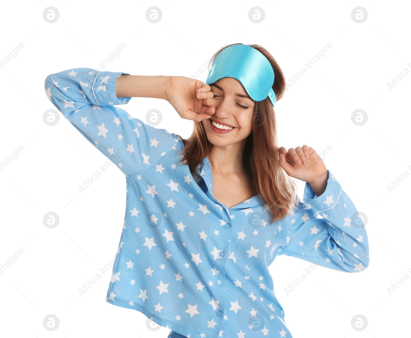 Photo of Beautiful woman wearing pajamas and sleep mask on white background. Bedtime