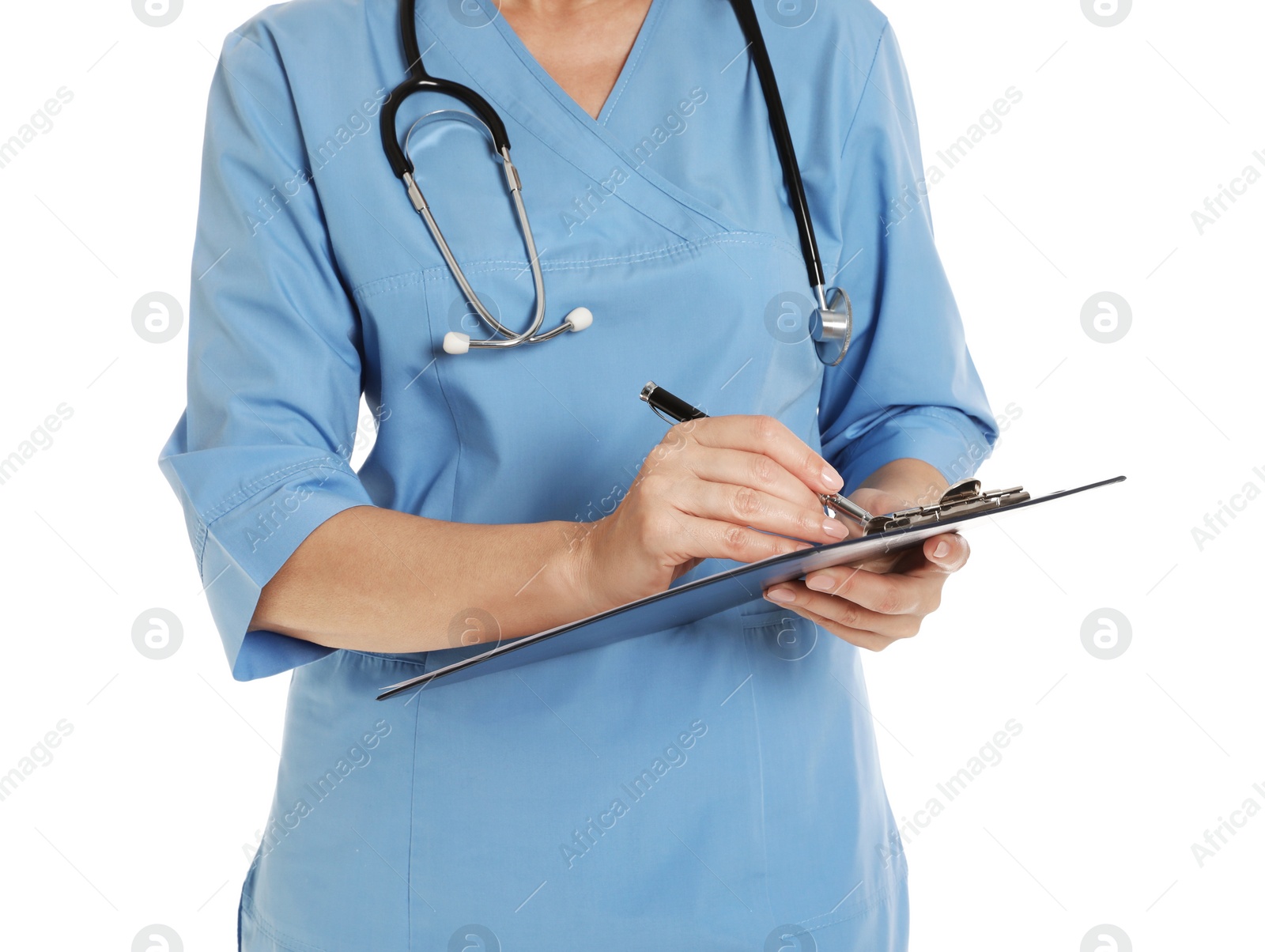 Photo of Closeup of female doctor in scrubs with clipboard isolated on white. Medical staff