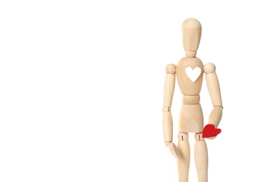 Photo of Wooden puppet with small heart on white background. Relationship problems