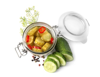 Photo of Jar with pickled cucumbers on white background, top view