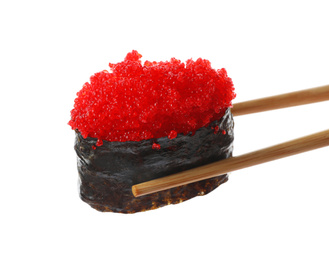 Photo of Chopsticks with tobiko sushi isolated on white